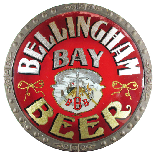 Bellingham Bay Beer reverse glass sign in the original frame, 19 1/2 inches in diameter (est. $30,000-$45,000). Showtime Auctions image.