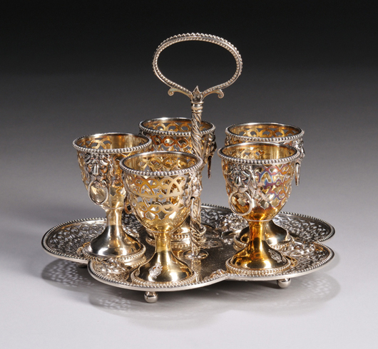 Victorian sterling silver eggcup holder, London, marks possibly for 1872, by George Fox, Estimate: $200-400. Skinner Inc. image.