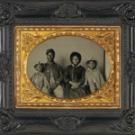 An ambrotype image of an unidentified African-American Union soldier with his wife and daughters. Library of Congress image, courtesy of Wikimedia Commons.