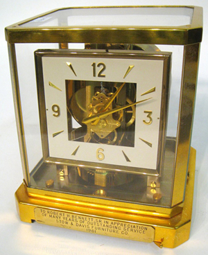 Gold toned and glass-cased LeCoultre Atmos clock dating to the early 1960s (est. $400-$700). Gordon S. Converse & Co. image.