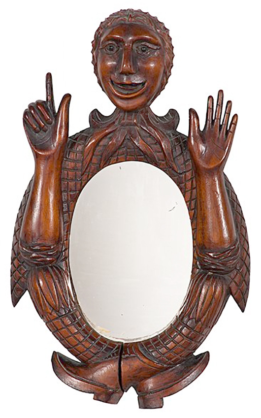 The mirror-frame man holding seven fingers up may be warning about the seven years of bad luck awaiting someone who breaks a mirror. The unique piece of folk art auctioned for $5,700 at Cowan's Auctions in Cincinnati.