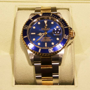 Men's Rolex Submariner watch. Government Auction image.