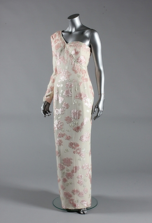 A Catherine Walker pink sequined ivory crepe gown with asymmetric neckline, worn at a banquet given by President Collor at the Itamaraty Palace while on a state visit to Brazil, April 23, 1991. Sold for £78,000 including buyer's premium. Kerry Taylor Auctions image.