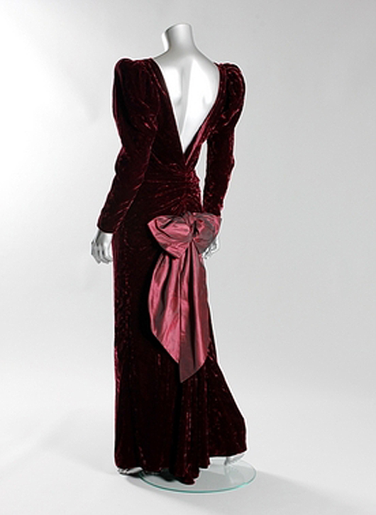A Catherine Walker burgundy crushed velvet evening gown, worn for a state visit to Australia and to the film premiere of 'Back to the Future,' 1985. Sold for £108,000 including buyer's premium. Kerry Taylor Auctions image.