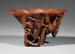 The highlight of the auction was one of the 18th century Chinese rhinoceros horn libation cup from the Headley-Whitney Museum, which sold for $185,000 to a U.S. bidder on LiveAuctioneers.com. Neal Auction Co. image.