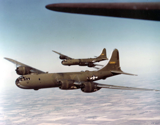 A vintage U.S. Air Force photo of two B29 Superfortresses in olive drab paint. Image courtesy of Wikimedia Commons.