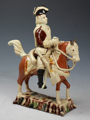 Whieldon/Astbury Staffordshire pottery equestrian figure with an officer, circa 1750. From John Howard at Heritage.
