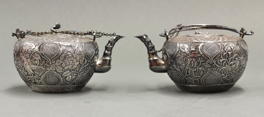 The most surprising lot of the sale was this pair of Chinese-export silver teapots. Expected to achieve $500 to $700, heated bidding drove the final sale price to $16,660. Clars Auction Gallery image.