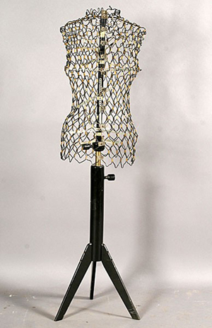 Even a vintage metal dress form like this one from Paris becomes a design element in a contemporary home setting. Image courtesy of LiveAuctioneers.com Archive and Kamelot Auctions.