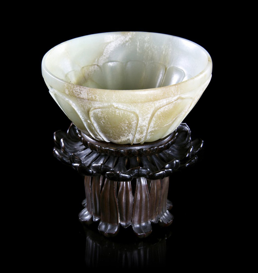 Chinese carved celadon jade bowl, diameter 5 1/2 inches. Price realized: $230,500. Leslie Hindman Auctioneers image.