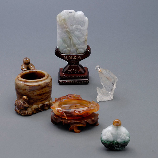 Group of five Chinese decorations including two washers, a jade plaque of boy and dragon, and two snuff bottles. Estimate: $400-$600. Michaan’s Auction image.