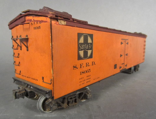 Highly realistic pre-WWII depiction of a Santa Fe Railroad boxcar, ‘third rail’ gauge. Ray Hoelz estate collection. Sterling Associates image.