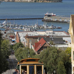 A San Francisco cable car no. 3 heading south on Hyde Street with Alcatraz Island in the distant background. Image by John O'Neill. Permission is granted to copy, distribute and/or modify this document under the terms of the GNU Free Documentation License, Version 1.2 only as published by the Free Software Foundation.