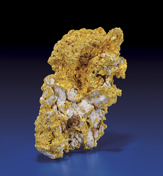 Gold nugget with natural quartz containing 3100g (99.67 ozt) of gold, origin central Victoria, Australia. Estimate $275,000-325,000. I.M. Chait image.