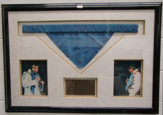 Beautifully mounted and framed Elvis Presley 1975 concert scarf bearing a facsimile signature of Elvis Presley. Ace Auctions Ltd. image.