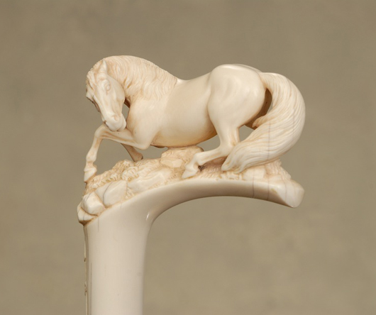 Breathtaking carved ivory horse cane. Tradewinds Antiques image.