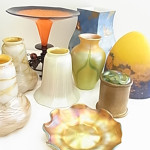 Selection of fine art glass including Tiffany, Quezal, Mueller, Baccarat and Schneider. Hess Fine Auctions image.