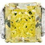 Lovely Cartier-certified 6.01-carat fancy intense yellow diamond ring. Estimate: $100,000-$200,000. A.B. Levy’s image.