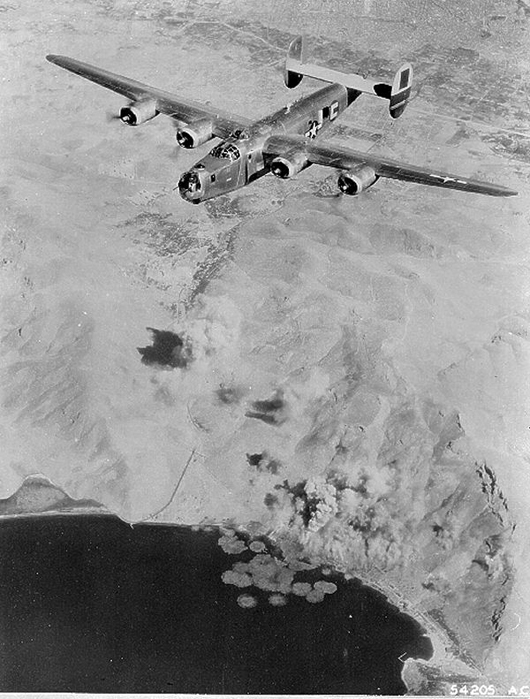 B-24 of the 464th Bomb Group on a bomb run. Image courtesy of Wikimedia Commons.