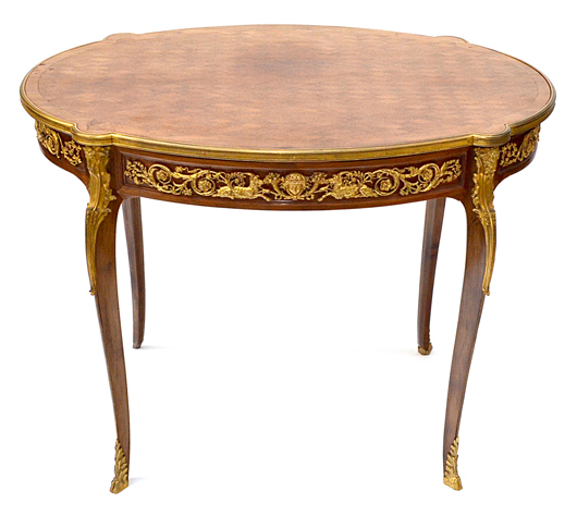 G. Durand ormolu mounted writing table. Roland Auction image.