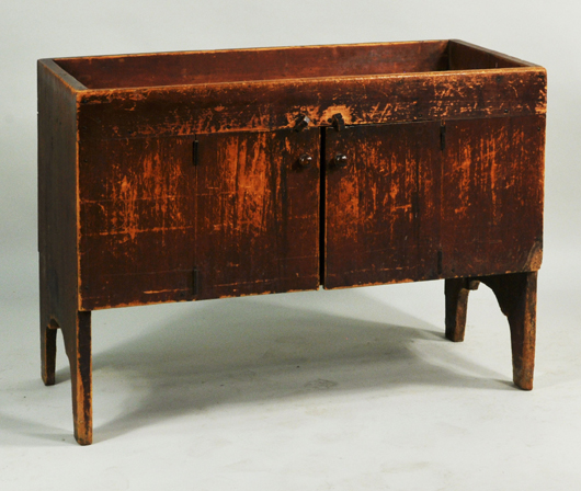 Early red painted dry sink. Woodbury Auction image.