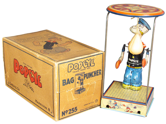 Popeye bag puncher tin toy No. 255 by J. Chein, near mint in the box, 9 1/2 inches tall. Price realized $3,600. Showtime Auction Services image.
