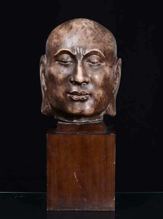 Extraordinary and rare marble Buddhist Luohan head. H: 31 cm. Courtesy Cambi Auction House, Genoa.