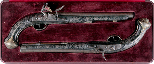 Pair of silver-mounted flintlock pistols for presentation to a potentate. Dreweatts London / Baldwin’s image.