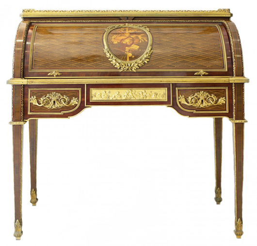 Late 19th or early 20th century mahogany marquetry and paquetry bureau a cylindre. Price realized: $36,000. A.B. Levy’s Auction image.