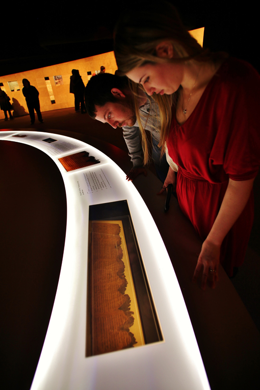 Visitors explore the Dead Sea Scrolls exhibit at the Franklin Institute in Philadelphia in May 2012. Photo credit: Darryl Moran/The Franklin Institute.