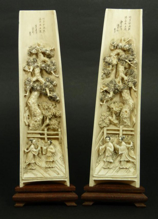 Chinese relief carved ivory scholar's desk wrist rest plaques, 9 inches high (est. $4,000-$6,000). Elite Decorative Arts image.