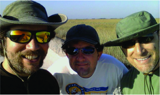 Snake hunters Joe Post, Gregg Jobes and Mark J. Rubinstein, who found a mysterious gold jewel in the Everglades while participating in the 2013 Python Challenge.