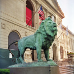 One of a pair of lion sculptures by Edward Kemeys that guard the entrance to the Art Institute of Chicago. Photo by Kim Scarborough, licensed under the Creative Commons Attribution-Share Alike 3.0 United States license.