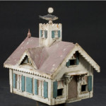 Birdhouses are among the most popular forms of garden art. This early folk art birdhouse has architectural details that might be seen on a real house, such as scalloped gables and trim, shutters, a spire finial, and even a fish-shape weathervane atop a widow's walk. The birdhouse is likely of New England origin and from the third quarter of the 19th century. Image courtesy of Cowan's Auctions and LiveAuctioneers Archive.