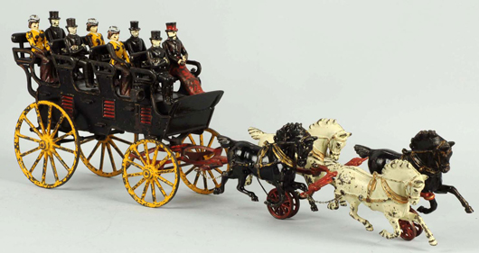 Hubley cast-iron horse-drawn 4-seat brake, 28in, original figures, est. $4,000-$6,000. Morphy Auctions image.