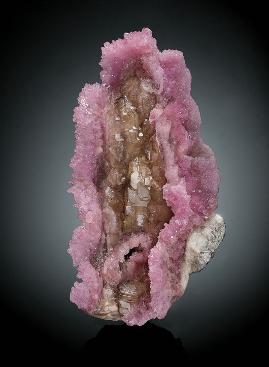 Mined in Brazil in the late 1950s, the La Madona Rose rose quartz specimen, 15.5 x 8 inches, set a price record as the most valuable fine mineral specimen ever offered at auction when it realized $662,500. Heritage Auctions image.