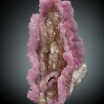 Mined in Brazil in the late 1950s, the La Madona Rose rose quartz specimen, 15.5 x 8 inches, set a price record as the most valuable fine mineral specimen ever offered at auction when it realized $662,500. Heritage Auctions image.