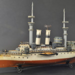 Marklin Battleship Maine, series 1, ‘unplayed-with’ condition, 30½ in long, $64,900. Bertoia Auctions image.