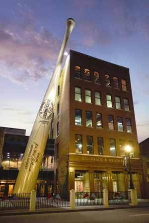 The Louisville Slugger Museum & Factory, with its famous 'Big Bat' entrance. Factoid: The bat is an exact-scale replica of Babe Ruth's R43 bat that Louisville Slugger designed to the specifications requested by the immortal New York Yankees slugger in the early 1920s. Image courtesy of Louisville Slugger Museum & Factory.