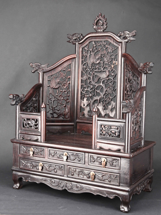 Exquisite openwork carved Zitan dresser, 28.5 inches tall. Estimate $6,000-$9,000. Linwoods image.