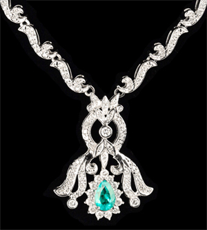 Ladies 14K white gold and diamond necklace with pear-shape emerald stone. Estimate $10,000-$15,000. Linwoods image.