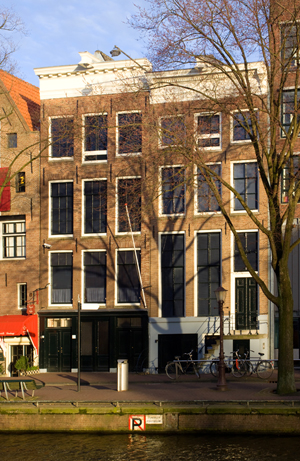 The Anne Frank House alongside the Prinsengracht in Amsterdam, the Netherlands. Photo by Massimo Catarinella, licensed under the Creative Commons Attribution-Share Alike 3.0 Unported license.