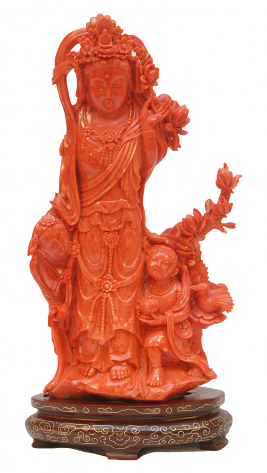 Large and heavy solid red coral sculpture depicting a maiden with children, 10 1/4 in tall. Elite Decorative Arts image.