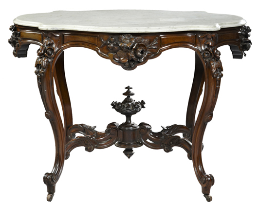 American carved rosewood marble-top center table (circa 1860), attributed to Alexander Roux, est. $5,000-$8,000. Crescent City Auction Gallery image.