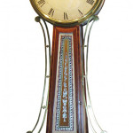 Early 34-inch banjo clock, circa 1802-1805, in the original crossband style, attributed to Simon Willard. Gordon S. Converse & Co. image.