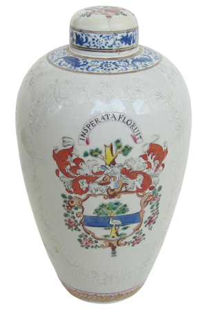 These urns were thought to be Chinese export pieces made in the 1700s, but they were made by Jacob Petit in France. Raised white lines are found on his 19th-century pieces.