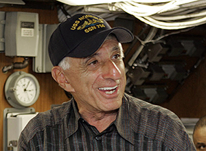 Jamie Farr, who played 'Klinger' in the TV show 'Mash' meets members of the crew of attack submarine the USS Norfolk on Sept. 7, 2007. Photo by Petty Officer 2nd Class Roadell Hickman.