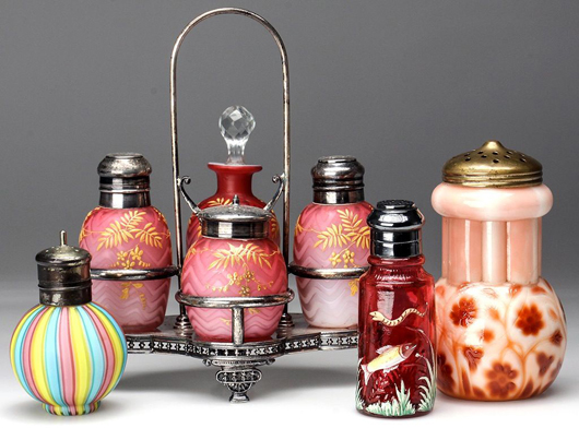 Large selection of rare art glass shakers and condiment sets. Jeffrey S. Evans & Associates image.