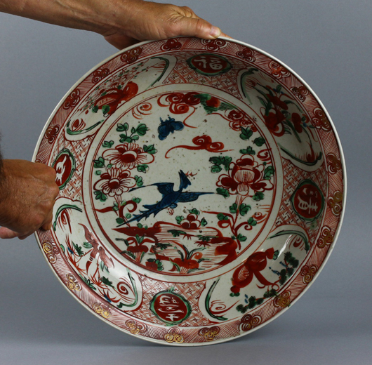 Early 17th-century Ming Zhangzhou (Swatow) polychrome enameled basin, 15½in dia., old labels and six-character Chinese mark on verso. Est. $1,000-$5,000. Manatee Galleries image.
