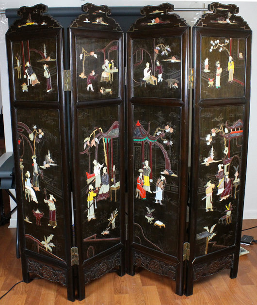 Chinese huanghuali screen with jade and hardstone embellishments and lively depictions of activities within an imperial or noble court. Est. $4,000-$5,000. Manatee Galleries image.